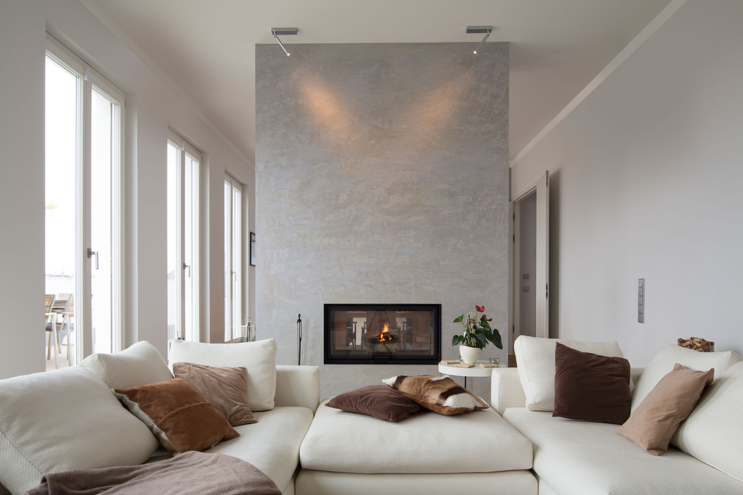 Living room renovation with modern fireplace feature wall — Islip, NY