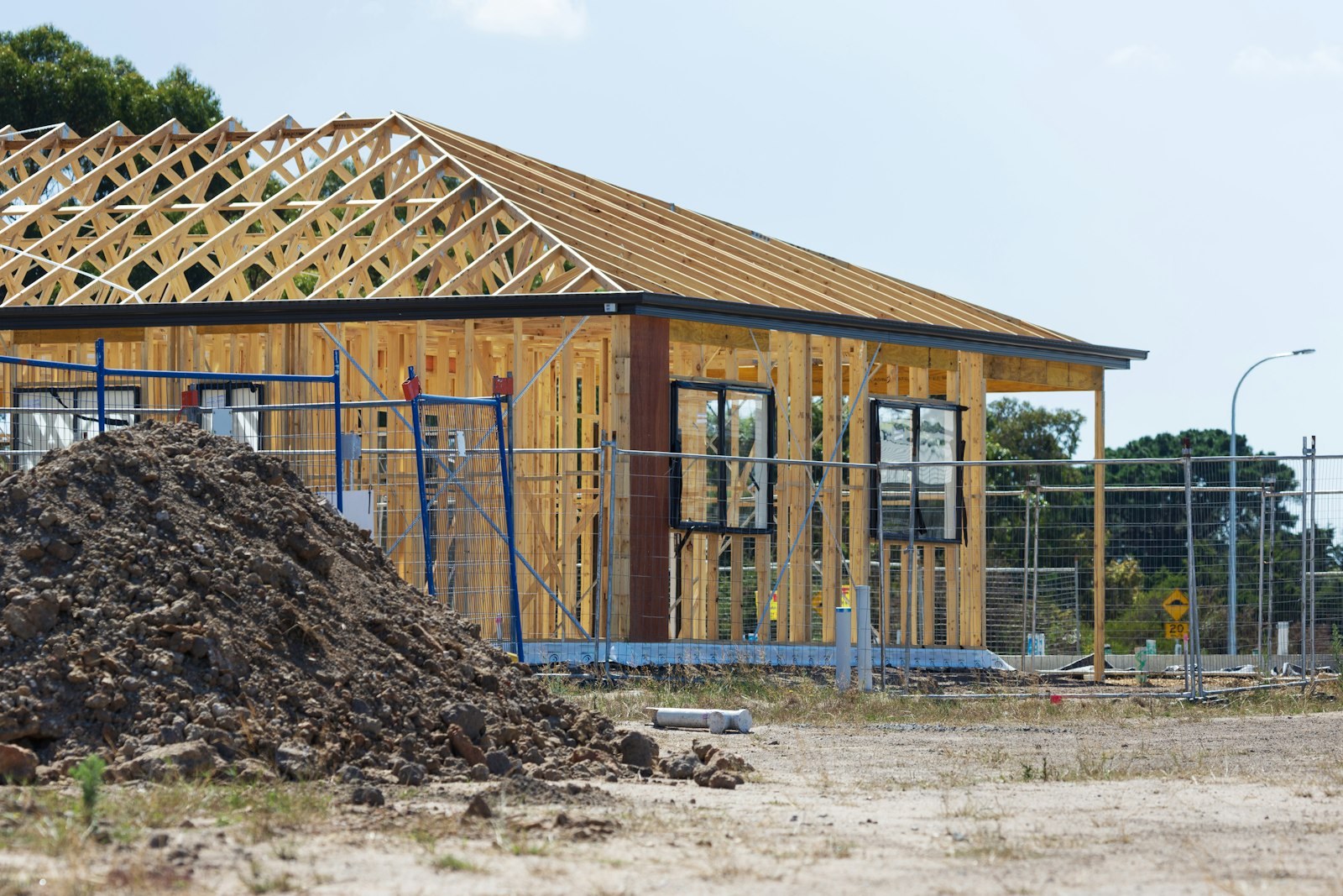 Milton's Construction team reviewing plans on a commercial construction site