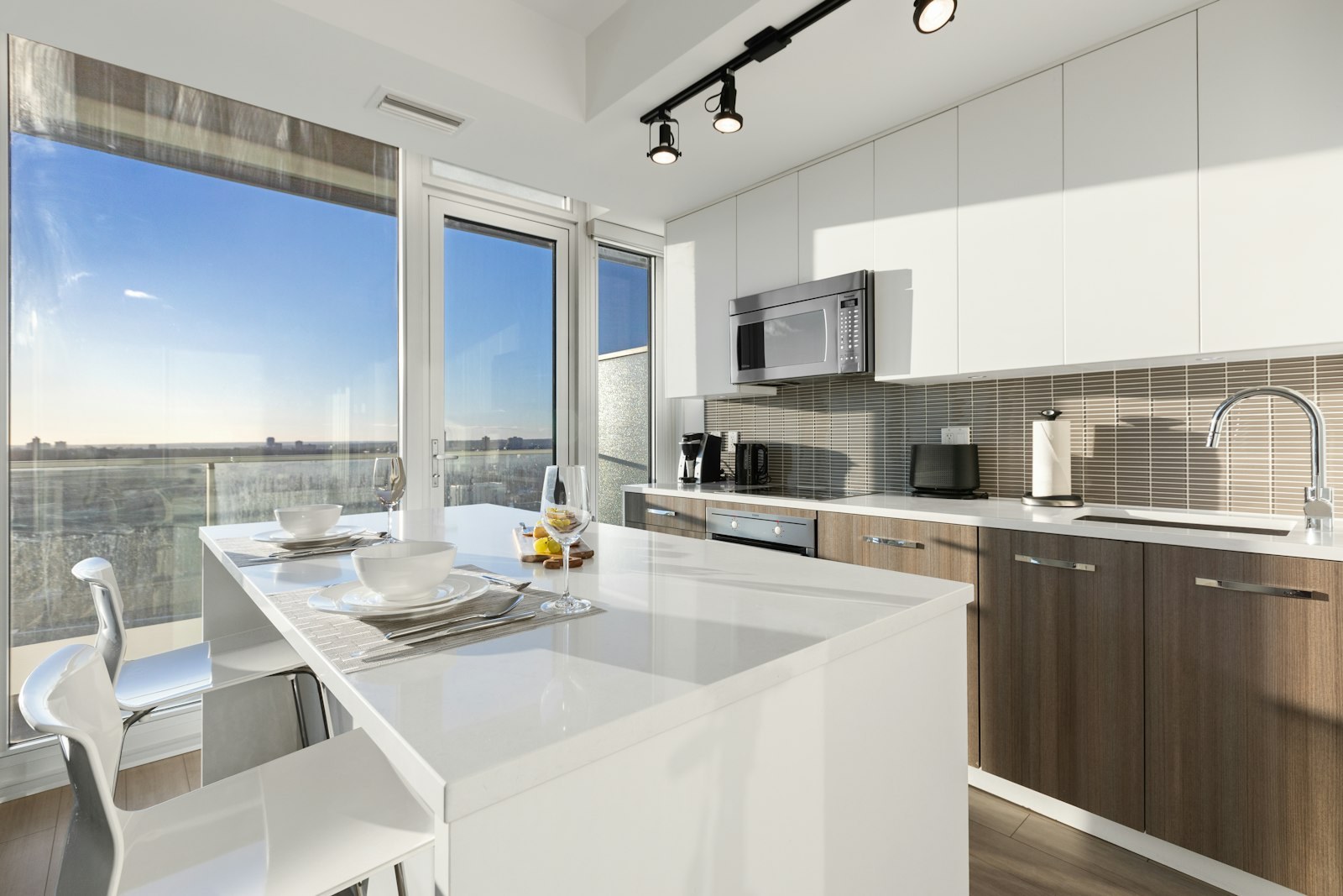 Two-tone kitchen renovation with center island — New York
