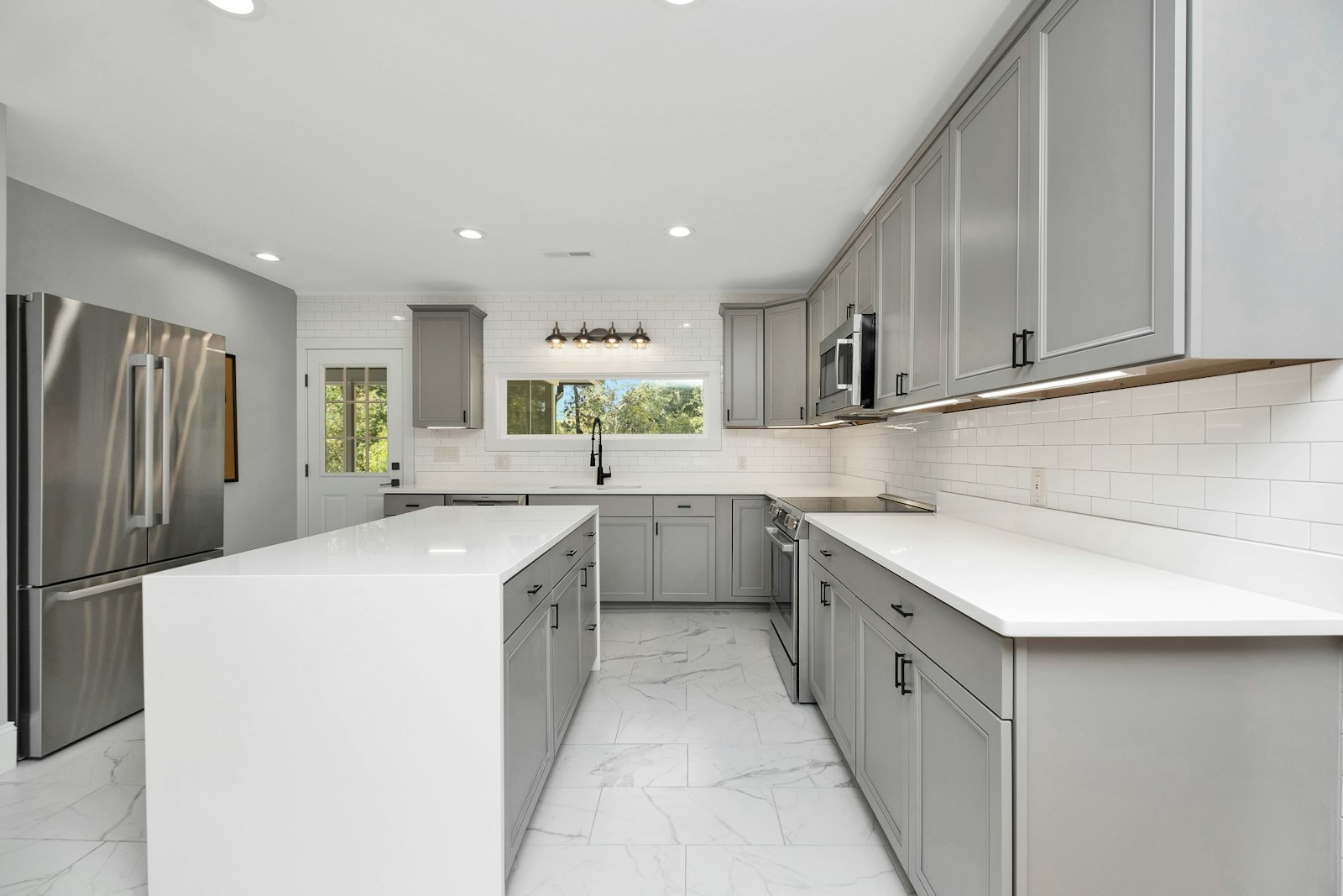 Two-tone kitchen renovation with center island — West Babylon, NY