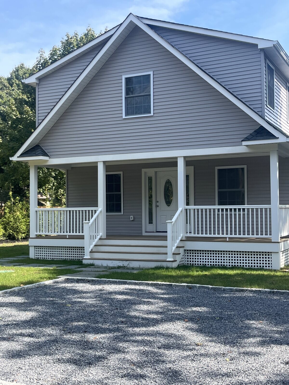 Completed front porch addition and home renovation, Long Island — serving Long Island