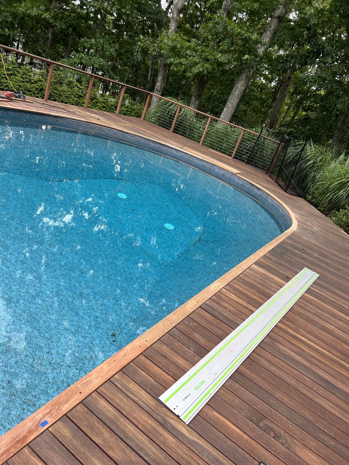 Custom deck and pool surround by Milton's Construction, Long Island NY — serving Pennsylvania
