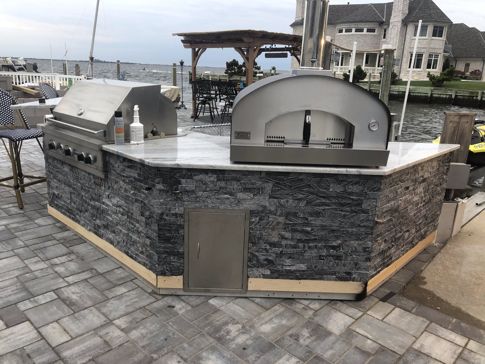Waterfront Outdoor Kitchen & Paver Patio — completed by Milton's Construction in Islip, NY
